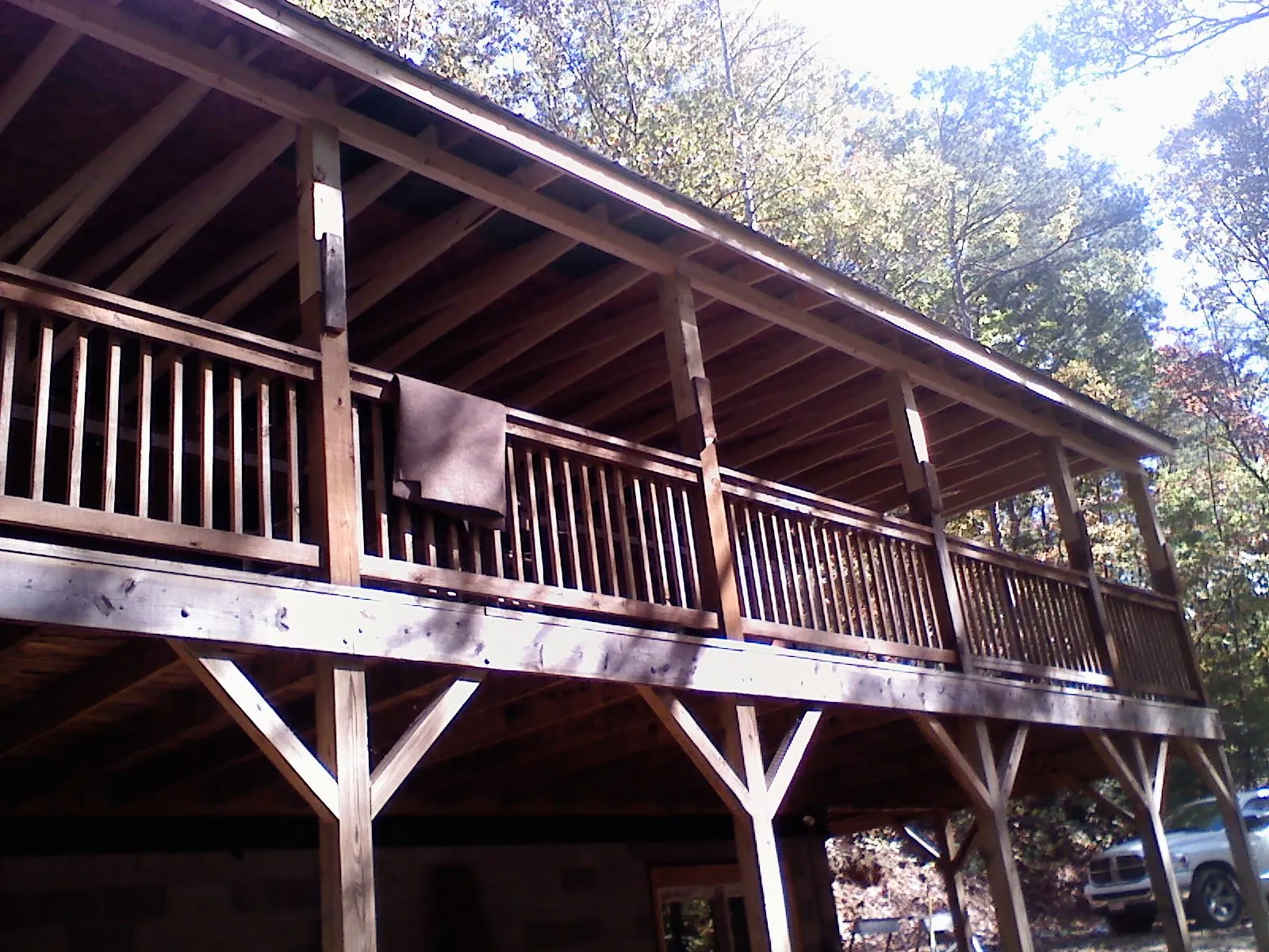 Timber framing under a new elevated porch and deck — Roof Leak Repair in North Bergen by Roofing Brothers